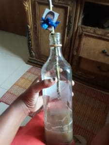 Lady cries out for help after stumbling upon her photo her best friend placed in a voodoo bottle