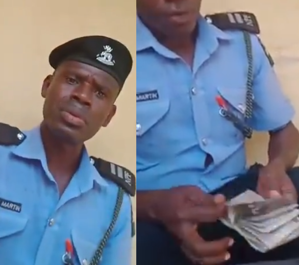 (Watch Video) Police officer caught on video counting money after "extorting" 40,000 from a man has been arrested (Watch video) 1