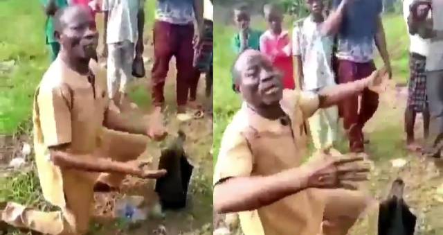 (VIDEO) Nigerian pastor caught Red Handed, packing Human shit in the Bush (video) 1