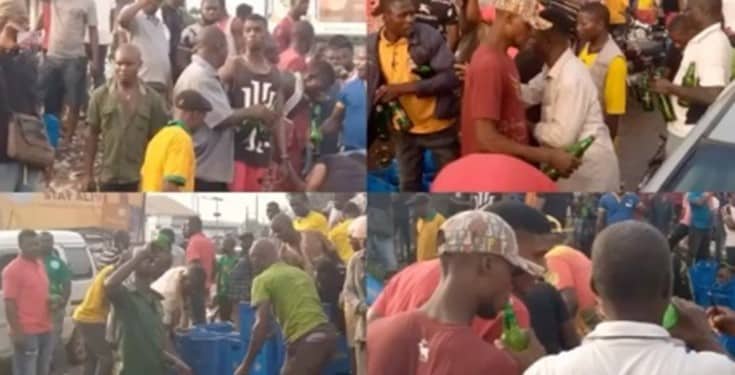Residents troop out to drink to stupor after a trailer of beer fell in Anambra State (video)